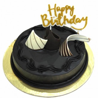 Truffle cake with happy birthday candle Online Cake Delivery Delivery Jaipur, Rajasthan